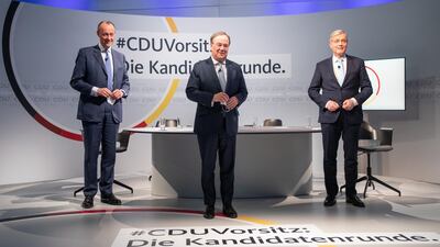 Germany's Christian Democratic Union (CDU) party, choses Armin Laschet (C) over Norbert Roettgen (L) and Friedrich Merz (R) as its next leader. EPA/Andreas Gora / POOL