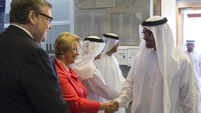 Sheikh Mohammed bin Zayed, greets Vicki Hollub, incoming chief executive of Occidental Petroleum, during the inauguration of the Al Hosn integrated gas facility. Ryan Carter / Crown Prince Court - Abu Dhabi