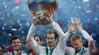 Murray celebrates with the trophy after winning the Davis Cup at Flanders Expo, Ghent, Belgium in 2015. Action Images via Reuters