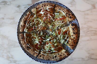 The Seuwarma pizza is inspired by Middle Eastern shawarma. Pawan Singh / The National