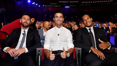 Messi, Ronaldo and Van Dijk pose for a photo. Getty Images