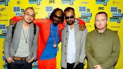 From left, Ted Chung, Snoop Lion, Suroosh Alvi and Andy Capper attend the Reincarnated screening at the 2013 SXSW festival in Austin, Texas. Mark Davis / Getty Images for SXSW / AFP