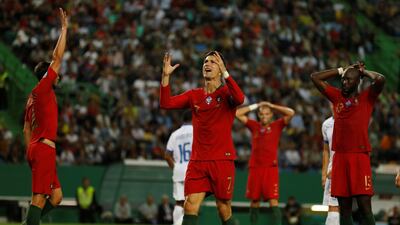 Portugal's Cristiano Ronaldo reacts after a missed opportunity to score REUTERS