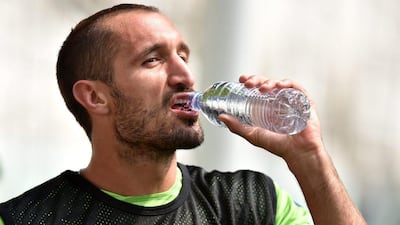 Giorgio Chiellini of Juventus takes a drink during training on June 1, 2015 in Turin, Italy. (Photo by Valerio Pennicino/Getty Images)