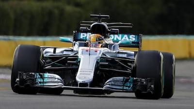 Mercedes' British driver Lewis Hamilton takes part in a practice session at the Hungaroring racing circuit in Budapest on Friday. Peter Kohalmi / AFP