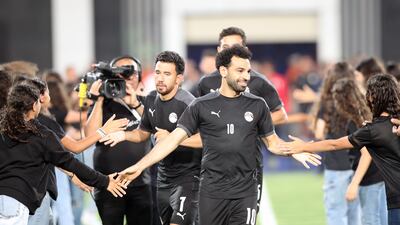 Mohamed Salah is greeted before the Afcon qualifying match between Egypt and Guinea in Cairo. EPA