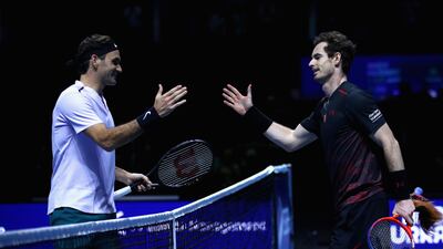 Roger Federer, left, and Andy Murray played in an exhibition in Glasgow on Tuesday, which Federer won. The world No 2 believes Andy Murray should not try and rush his return to competitive action from a hip injury. Clive Brunskill / Getty Images
