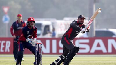 Rohan Mustafa of UAE plays a shot.