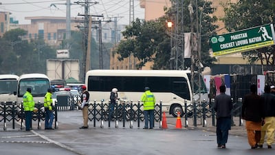Buses carrying Sri Lanka's and Pakistan's cricketers arrive at the Pindi Cricket Stadium. AFP