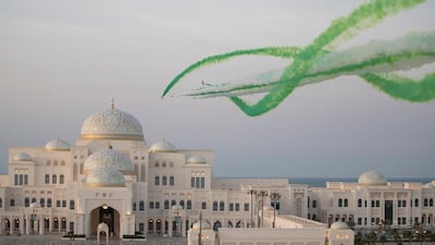 The Al Forsan aerobatic team perform a flyby during the arrival of Prince Mohamed bin Salman.