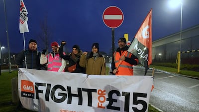 Members of the GMB union on the picket line in Coventry. PA