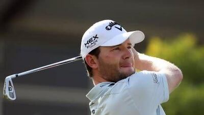 Branden Grace of South Africa practises at Jumeirah Golf Estates yesterday.