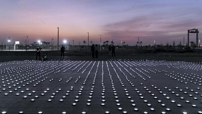 Volunteers set up a 20mx20m light installation.