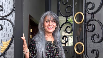 Fakhria Lutfi stopped dyeing her hair when she suspected it was contributing to allergic reactions. Leslie Pableo / The National