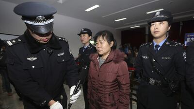 Zhang Shuxia, an obstetrician involved in baby trafficking, is accused of selling babies after telling parents that their newborn babies had infectious diseases or congenital malformation, according to local media. China Daily / Reuters