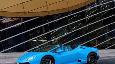 A Lamborghini Huracan Spyder outside a Metro station in Dubai. Cloud 9 Photography