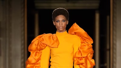 With frilled sleeves, this bright orange mini dress is from Christian Siriano's spring summer 2022 collection. Photo: Christian Siriano