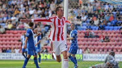 Peter Crouch celebrates scoring Stoke's second at the DW Stadium. Chris Brunskill/Getty Images