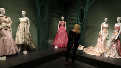 Oscar de la Renta outfits on display in Dallas in a new retrospective on his career at the George W. Bush Library and Museum. AP Photo / LM Otero