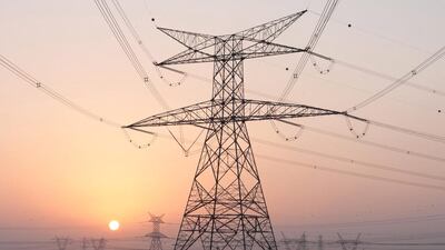 Above, power lines operated by Dubai Electricity and Water Authority. Duncan Chard / Bloomberg