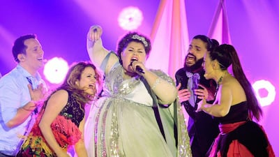 10th place: Bojana Stamenov, centre, representing Serbia performs during the Grand Final of the 60th annual Eurovision Song Contest. Julian Stratenschulte / EPA