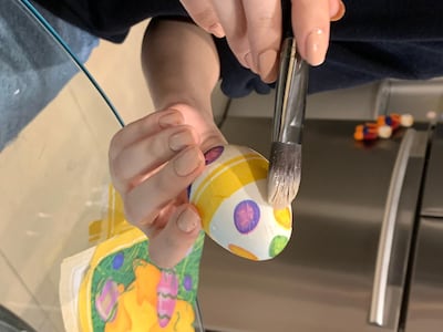 Make sure to brush the cutouts on the egg surface gently, lest you tear the napkin. Razmig Bedirian