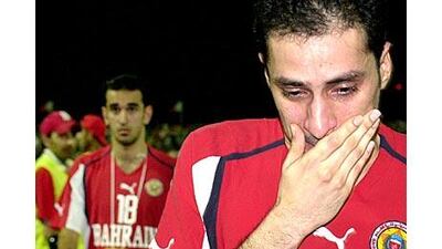 Bahrain's Salman Isa leads the team off the pitch after losing to Trinidad & Tobago. It is a scene they hope is not repeated against Saudi Arabia.
