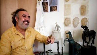 Iraqi artist Natiq Al Alousi in his Abu Dhabi studio. Christopher Pike / The National