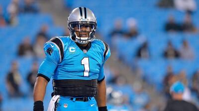 Cam Newton of the Carolina Panthers looks on before a game in November against the New Orleans Saints. Grant Halverson / Getty Images / AFP / November 17, 2016