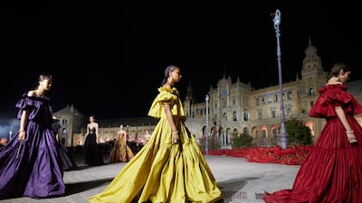 Jewel-toned gowns at Dior Cruise 2023. Getty Images