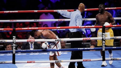 Amir Khan after a low blow shot by Terence Crawford. Reuters