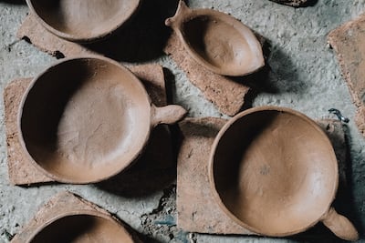 Traditional motifs and forms, including fish, turtles, frogs and female shapes, inform much of the region's pottery. Erin Clare Brown / The National
