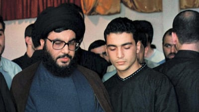 PRO-IRANIAN HIZBOLLAH LEADER SHEIKH HASSAN NASRALLAH STANDS WITH HIS SON JAWAD TO VIEW HIS ELDEST SON HADI' S BODY. MIDEAST-- RP1DRIGCBFAD