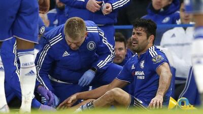 Diego Costa receives treatment for his shin injury before heading to hospital for a scan. John Sibley / Reuters