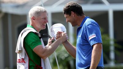 Padraig Harrington celebrates with his caddie after winning on the second play-off hole of the Honda Classic at PGA National Resort & Spa - Champion Course on March 2, 2015 in Palm Beach Gardens, Florida. Sam Greenwood / Getty Images