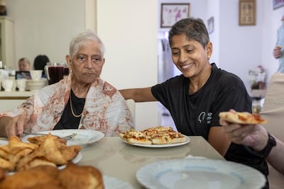 Margaret Dsouza with her daughter Zemia at the 4get-me-not Dubai support group. Antonie Robertson / The National