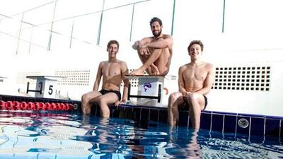 The Portuguese Tiago Venancio, centre, has grown a beard to make it harder for himself while training in the water.