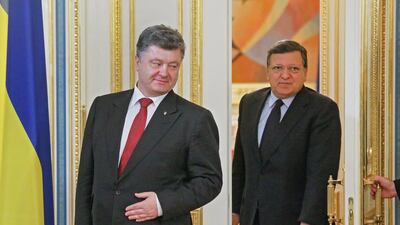 The Ukrainian president Petro Poroshenko, left, and Jose Manuel Barroso, the outgoing president of the European Commission, meet in Kiev, Ukraine, on September 12, 2014. Sergey Dolzhenko / EPA
