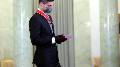 Bayern Munich's Polish striker Robert Lewandowski during the award ceremony of the Commander's Cross of the Order of Polonia Restituta at the Presidential Palace in Warsaw on Monday, March 22, 2021. EPA