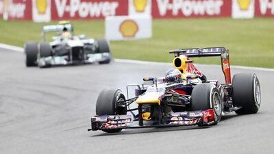 It took Sebastian Vettel just four turns to drive past Lewis Hamilton at Spa on Sunday. Francois Lenoir / Reuters