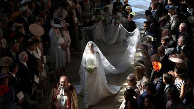 Meghan Markle walks down the aisle as she arrives in St George's Chapel at Windsor Castle for her wedding to Prince Harry in Windsor, Britain, May 19, 2018. Danny Lawson/Pool via REUTERS