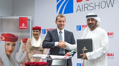 Sheikh Ahmed bin Saeed of Emirates Airlines and Guillaume Faury of Airbus at the announcement of a $16bn deal for 50 new jets at the Dubai Airshow. Leslie Pableo for the National