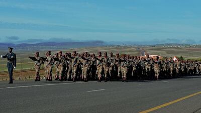 South African armed forces parade before the funeral procession carrying the coffin of Mandela. Carl de Souza / AFP Photo