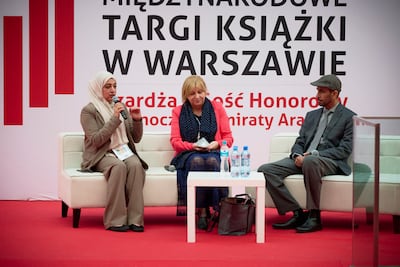 Emirati author Sultan Al Ameemi (right) and Polish writer Radek Rak (centre) discuss literary exchange between Poland and the UAE at the Warsaw International Book Fair. Photo: Sharjah Book Authority