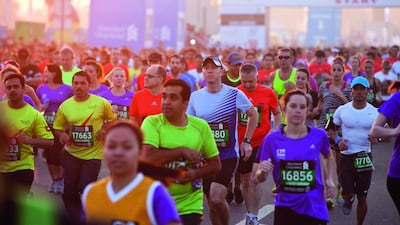 Runners compete in the 10 km race in Dubai. Antonie Robertson/The National