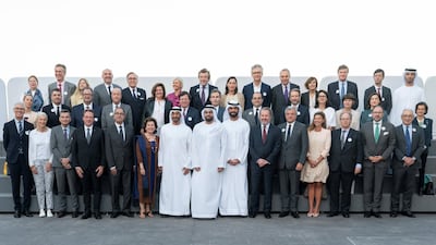 Sheikh Mohamed bin Zayed, Crown Prince of Abu Dhabi and Deputy Supreme Commander of the Armed Forces (front row 7th L), stands for a photograph with members of Comite Colbert, during a Sea Palace barza. Seen with Mohamed Khalifa Al Mubarak, chairman of the Department of Culture and Tourism and Abu Dhabi Executive Council member (front row 8th L) and Saif Ghobash, director general of Abu Dhabi Tourism and Culture Authority (9th L). Hamad Al Kaabi / Ministry of Presidential Affairs ---