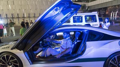 The plug-in hybrid BMW i8 from Dubai Police’s supercars fleet outside Dubai Mall. Antonie Robertson / The National