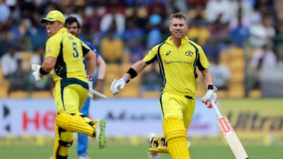 Australia's David Warner, right, and Aaron Finch put together 231 runs for the first wicket. Rajanish Kakade / AP Photo