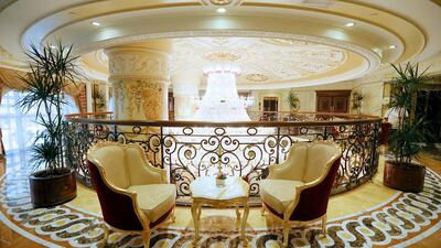 The Royal Rose Hotel, Abu Dhabi. Its exterior hints to a 17th century French palace. Its interior is equally opulent, with walls overlaid in intricate gold-leaf designs. Fatima Al Marzooqi / The National