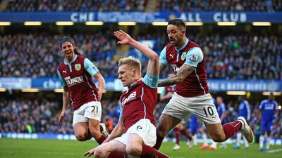 Ben Mee of Burnley celebrates scoring against Chelsea to level it 1-1 in their draw at Stamford Bridge on Saturday. Paul Gilham / Getty Images